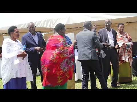 MZEE KOSIA KUTESA PRESENTATION TO BISHOP ALFRED