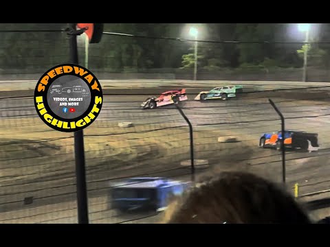 Several hard racing laps ending with a cars connecting - dirt track racing video image