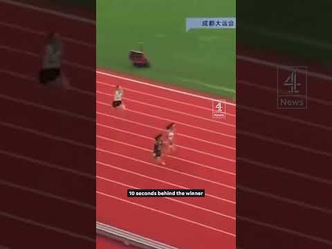 Why was this sports minister suspended?