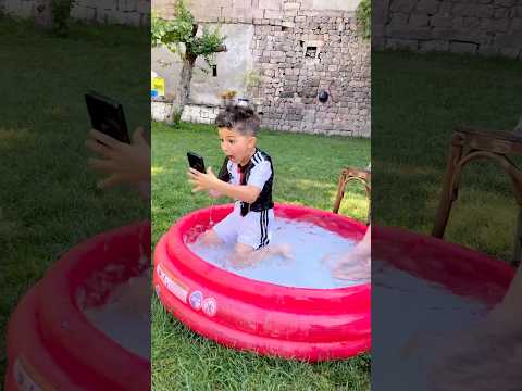 Funny kid dropped the phone in water 😂♥️👻#shorst