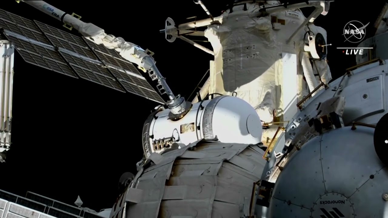 Cosmonauts take a spacewalk to relocate hardware