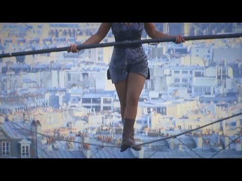 Hanging by a thread: Tightrope walker achieves 35m high stunt in Paris