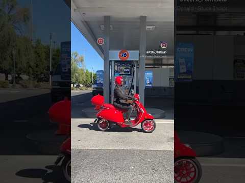 Turn the gas station into a snack station on an electric Vespa!