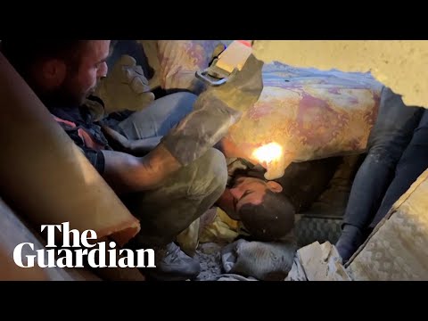 'My wife? Ahmed?': father asks after family while stuck under rubble in Gaza