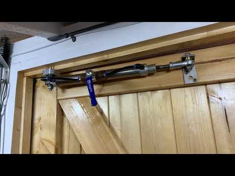 Click to view video "Simple solution" to stopping the shed door from blowing around