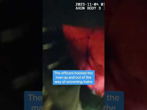 Dramatic train track rescue by NYPD
