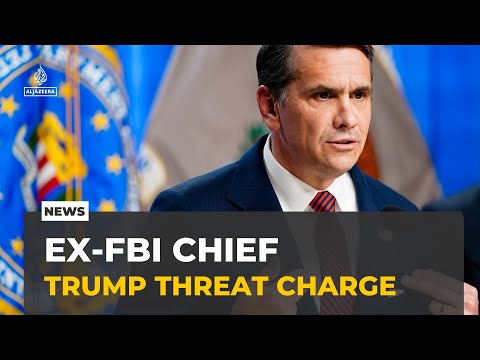 US Justice Department charges ex-FBI chief over alleged Trump threat, warrant issued