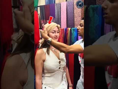 This man is teaching this woman to were a head scarf 😱🫡 #shorts #respect #ytshorts