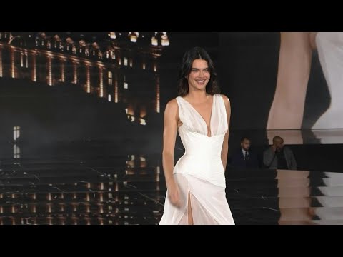 Stars walk runway for L'Oreal show during Paris Fashion Week | AFP