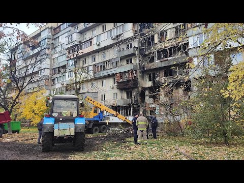Residents clear rubble after deadly Russian strike on Kyiv | AFP