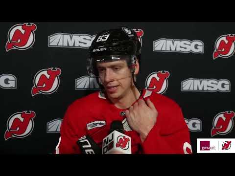 Miles Wood and Jesper Bratt speak prior to the team's departure for Buffalo | NEW JERSEY DEVILS