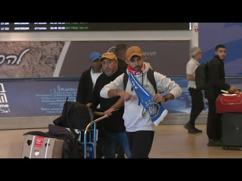 Israeli football fans arrive in Tel Aviv after Amsterdam football clashes | AFP