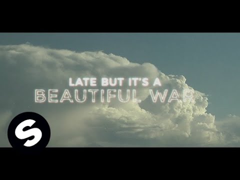 tyDi Ft. Lola Rhodes - Beautiful War (Official Lyric Video) - UCpDJl2EmP7Oh90Vylx0dZtA