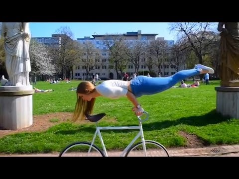 Artistic Cycling Tricks by Viola Brand | People Are Awesome - UCIJ0lLcABPdYGp7pRMGccAQ