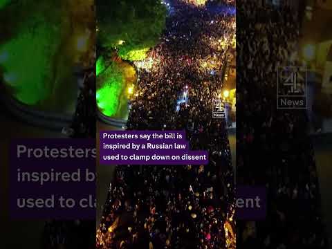 Thousands march in Georgia's capital against a controversial 'foreign agents' bill