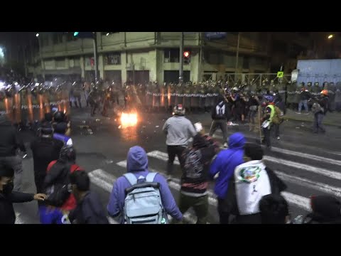 Peru anti-government protesters clash with police | AFP