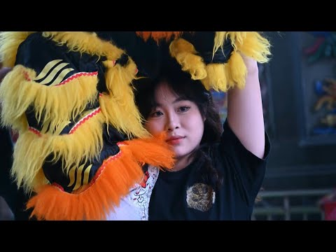 Chinese lion dance troupe shrugs off patriarchal past | AFP