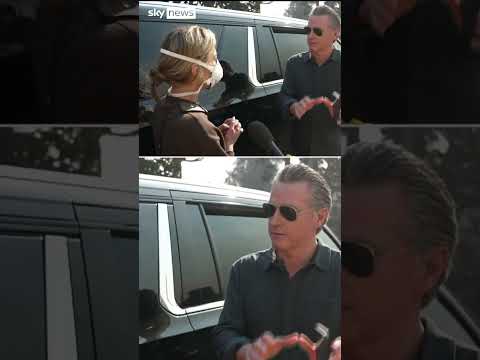 Moment woman confronts California governor
