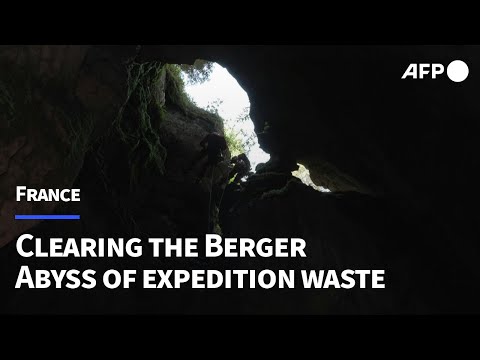 Cavers dive into France's Berger Abyss to remove decades of expedition waste | AFP