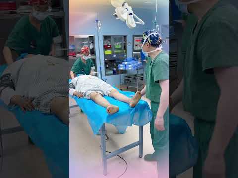 The elderly man lay on the operating table waiting for the doctor to perform surgery. #doctor