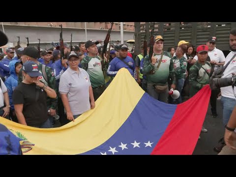 Pro-Maduro protesters march against US naval build-up in Caribbean | AFP