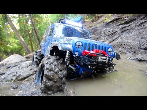 RC ADVENTURES - Stuck in Mud - Swamp Bogging in a 4x4 Jeep Wrangler Rubicon Radio Controlled Truck - UCxcjVHL-2o3D6Q9esu05a1Q