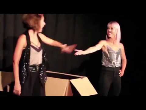 Cardboard Box penetration illusion   Female magician magic show