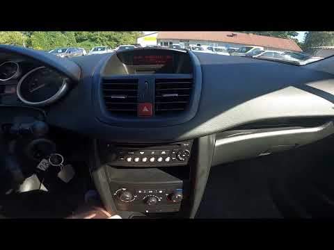 Come modificare l'ora su una Peugeot 207