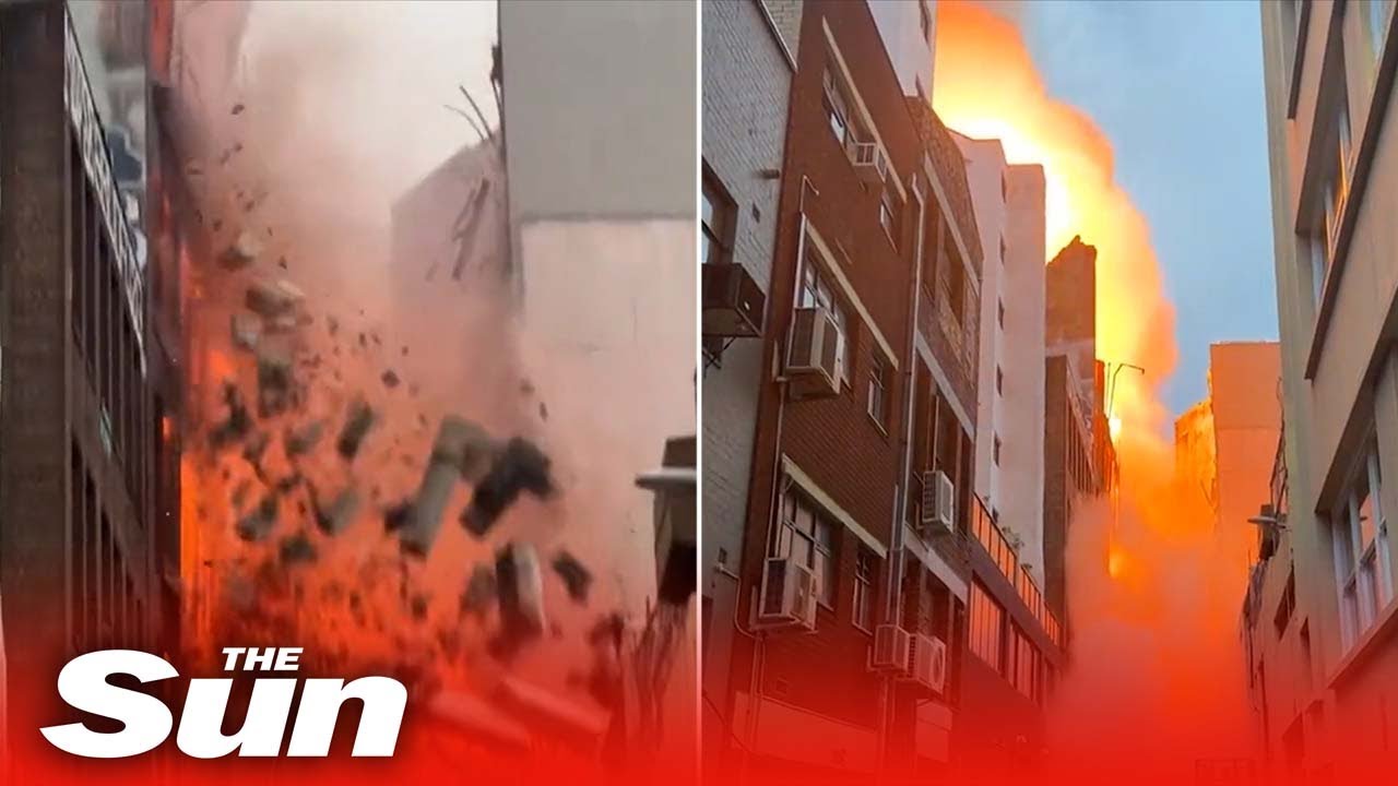 Wall crumbles as multi-story Sydney engulfed in flames