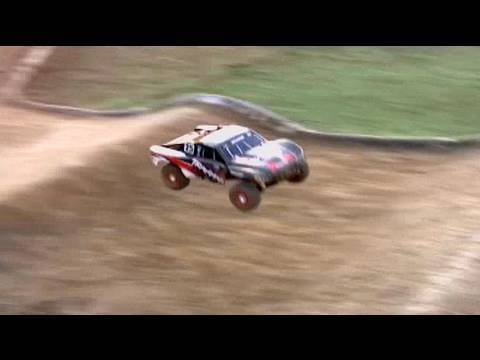 Traxxas Slash 4x4 - box stock on the track, driving while filming - UCyhFTY6DlgJHCQCRFtHQIdw