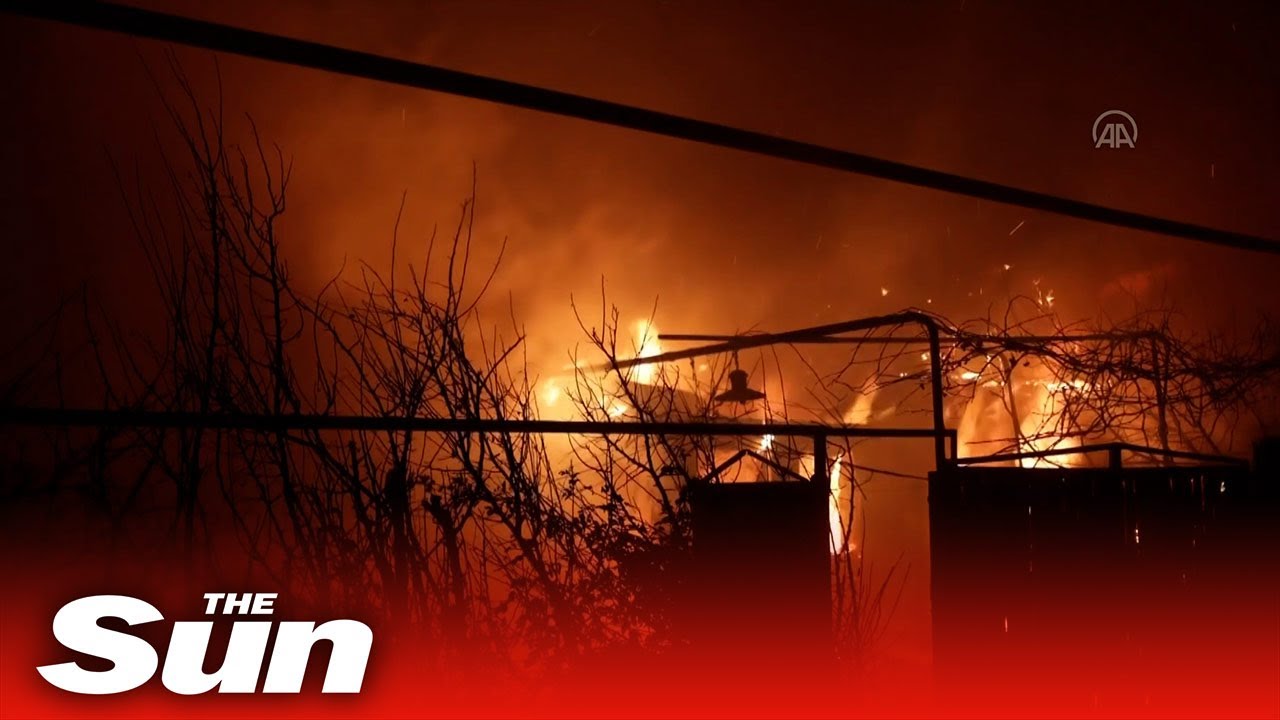 Massive flames burn through Ukrainian village after Russian strike