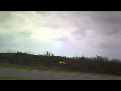 RC Airshow Flight of a Yellow Nitro Plane - UCDmaPHBzr724MEhnOFUAqsA