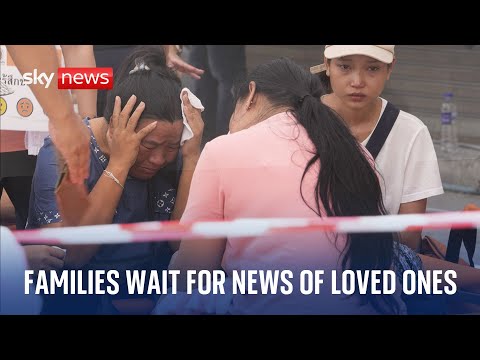 Families in Bangkok face agonising wait for news of those trapped under rubble after earthquake