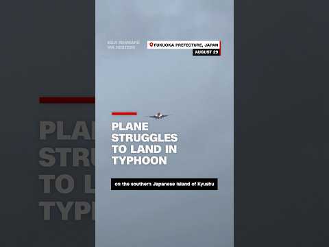 Watch plane struggle to land in typhoon