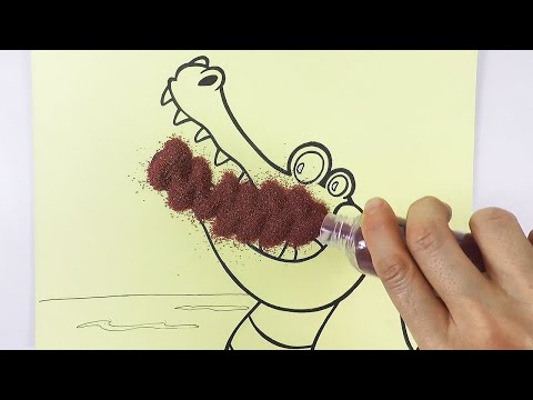 Sand drawing of a crocodile trying to eat a monkey