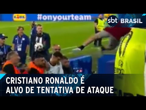 Segurança salva Cristiano Ronaldo de "voadora" após jogo da Eurocopa | SBT Brasil (27/06/24)