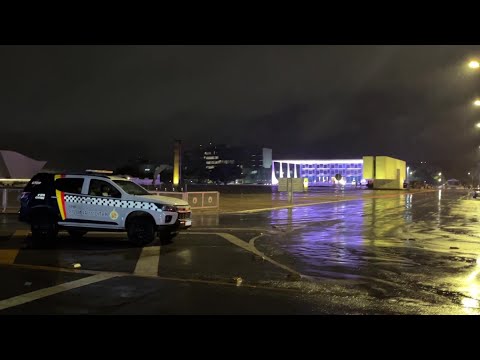 Police vehicles on scene after explosions near Brazil's Supreme Court | AFP