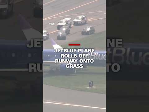JetBlue plane rolls off runway onto grass