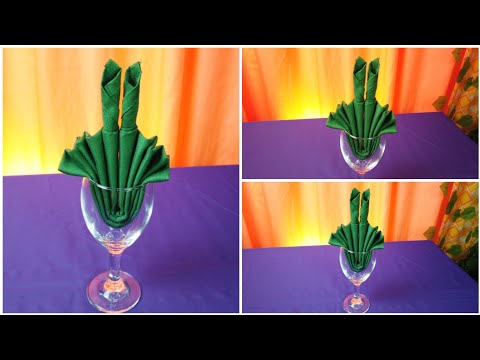CANDLE W/ LEAF NAPKIN FOLDING WITH THE GLASS