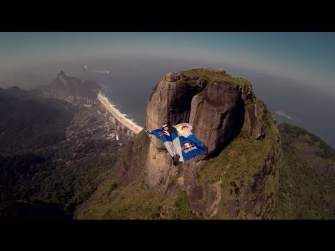 Wingsuit gliding over Pedra da Gávea in Rio de Janeiro - UCblfuW_4rakIf2h6aqANefA