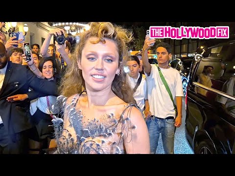 Miley Cyrus Nearly Puts It All On Display In Barely There Feathers & Leather Outfit In Paris, France