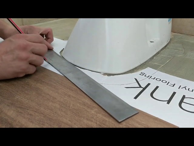 How to Cut Vinyl Flooring Around a Toilet