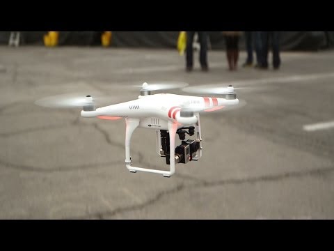 DJI Phantom 2 drone at CES 2014 | Consumer Reports - UCOClvgLYa7g75eIaTdwj_vg