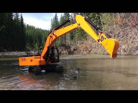 RC ADVENTURES - Piling Rocks in a River with a 4200xl Hydraulic Excavator 1/12 scale - UCxcjVHL-2o3D6Q9esu05a1Q