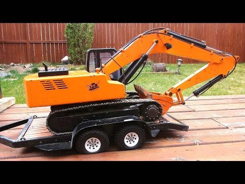 RC ADVENTURES - Flat Tire, Overloaded Trailer & Log Bridge - Earth Digger 4200 XL Excavator - UCxcjVHL-2o3D6Q9esu05a1Q