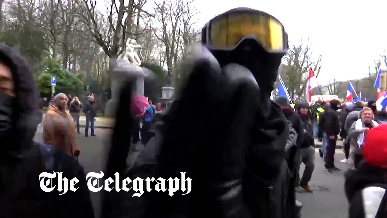 TV crew attacked as protest against Covid measures turns violent
