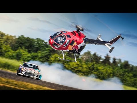 Aerobatic Helicopter Chases Drifting Race Car - UCblfuW_4rakIf2h6aqANefA