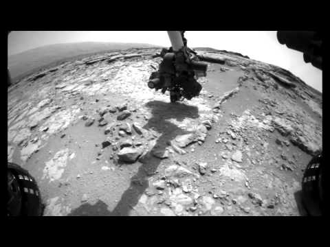 Curiosity Brushes Dust Off Martian Rock | Video - UCVTomc35agH1SM6kCKzwW_g