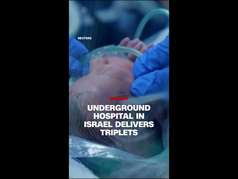 Woman gives birth to triplets in underground Israeli hospital