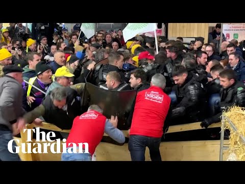 Farmers storm agriculture fair and scuffle with police in Paris